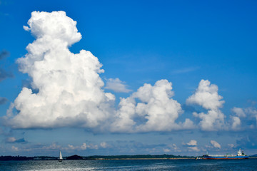 Fototapeta na wymiar Cumulonimbus cloud form above tropical sea