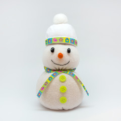 Photo of snowman isolated on neutral background
