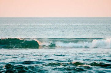 Spectacular sunset on the coast with orange tones