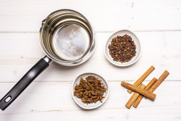 Recipe step by step hot red mulled wine on grey wood