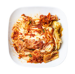 top view of kimchi in white bowl isolated