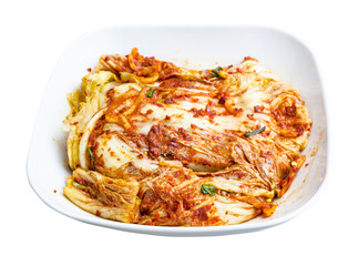kimchi appetizer in white bowl isolated on white