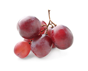Ripe sweet grapes on white background