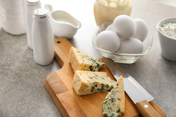 Different milk products on grey table