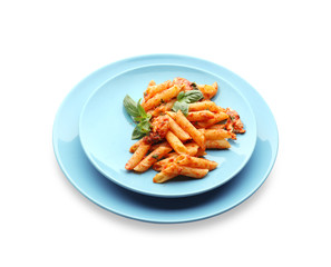 Plates with tasty penne pasta on white background