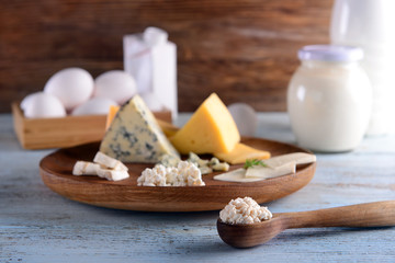 Different milk products on wooden table