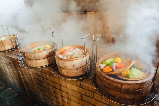 Hot steam to steamed vegetables and seafood without oil ,It is good for health.Japanese call "Jigoku mushi kannawa" in Beppu,Oita,Japan