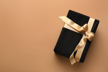 Beautiful gift box on color background - Powered by Adobe
