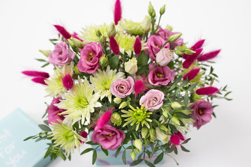 joyful floral arrangement in a gift box