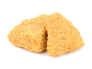 Brown Unrefined Demerara Cane Sugar Cube Chunk Pieces Isolated on White Background.