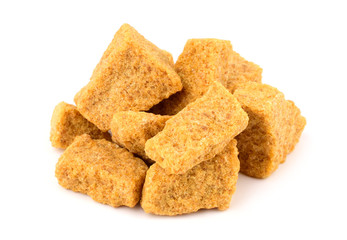 Brown Unrefined Single Evaporated Demerara Cane Sugar Cube Chunk Pieces Isolated on White Background.
