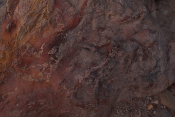 Red and brown big stone