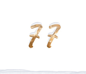 Gold Number 77 with Snow on white background