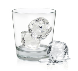 Ice cubes in empty rocks glass isolated on white background including clipping path	