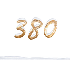 Gold Number 380 with Snow on white background