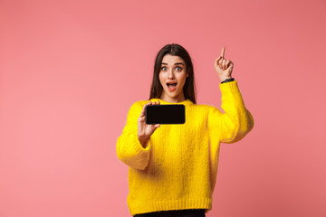 Cheerful young girl wearing sweater