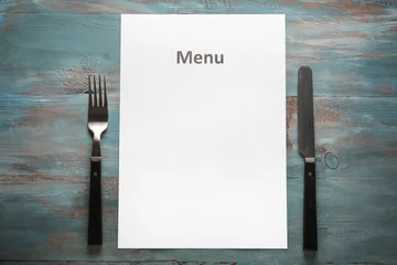 Fotobehang Blank menu with cutlery on wooden table © Pixel-Shot