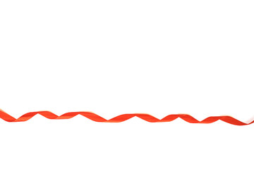 Festive red ribbon isolated on white background.