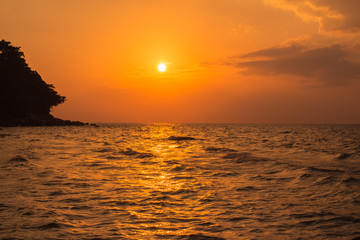 View of the ocean at night in Nai Yang Beach from Phuket Thailand