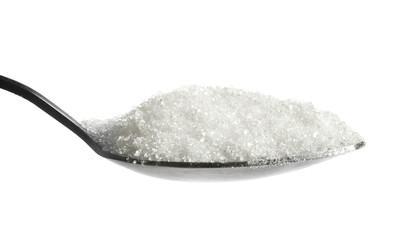 Spoon with sugar on white background