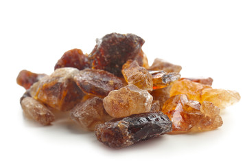 Pieces of sugar on white background