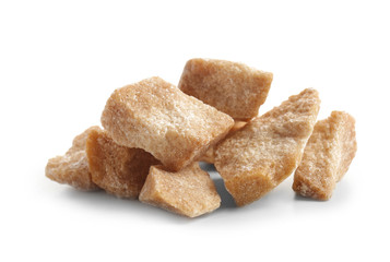 Pieces of sugar on white background