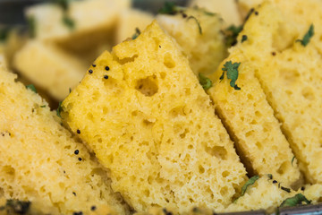 Gujarati Khaman Dhokla or Steamed Gram Flour Snack Close up - Indian Cuisine