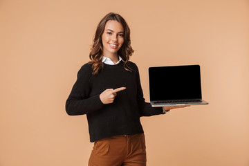 Happy young woman wearing sweater