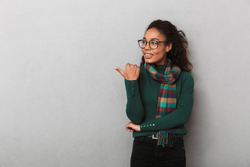 Cheerful african woman wearing sweater