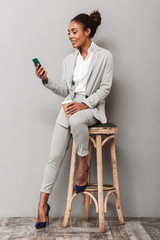 Full length portrait of a confident african business woman