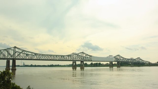 Bridge on Mississippi river in Natchez timelapse close up