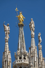 Statues on top of roof cathedral in Milan