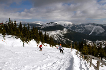  Famous ski resort in Czech Rupublic - Spindleruv Mlyn.  People on mountain , the chairlift .