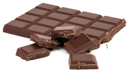 Milk chocolate pieces isolated on white background