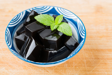 Closeup of traditional Chinese herb food Guiling Jelly. Guilinggao, a traditional Chinese Herb-Made Dessert.