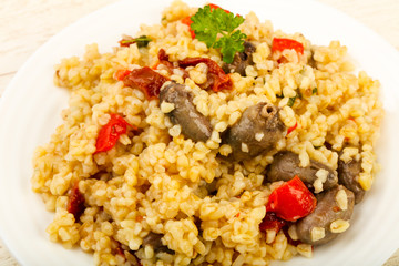 Bulgur with chicken hearts