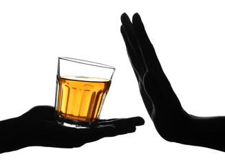 Woman refusing to drink whiskey on white background. Concept of alcoholism