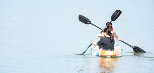 A kayaking sports event with lady participants