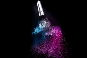 purple and blue ocean powder color splash and brush for makeup artist or graphic design in black background, look like a lively and joyful mood.