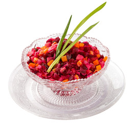 Vinaigrette. Vegetable salad with beets and mushrooms. On white background.