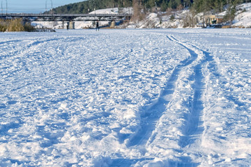 Fototapeta na wymiar Track for ski in winter under bridge in the morning