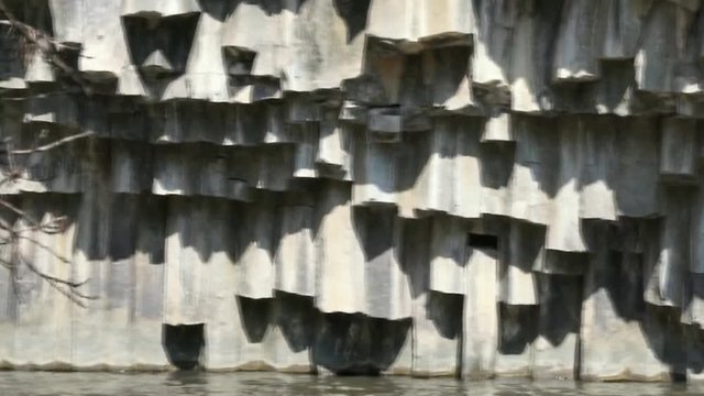 Basalt hexagon ( hexahedron) pool on Golan Heights. Meshushim nature pool in national nature park at north part of Israel