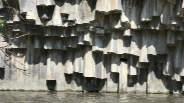 Basalt hexagon ( hexahedron) pool on Golan Heights. Meshushim nature pool in national nature park at north part of Israel