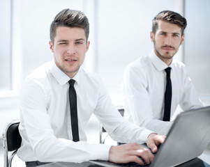 Fototapeta premium Businessman using laptop