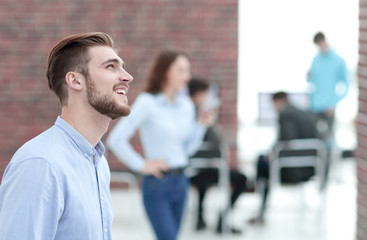 Portrait of young businessman in office.