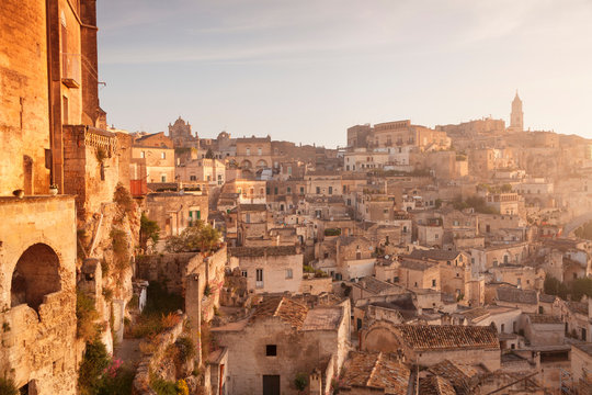 View over Sasso Caveoso to the cathedral at sunrise, UNESCO World Heritage Site, Matera, Basilicata, Puglia, Italy, Europe