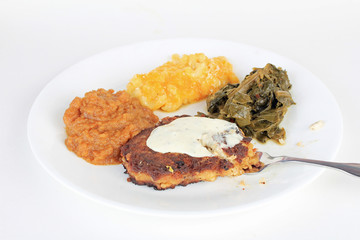 Canned Salmon Pattie fried and served with Soul Food Vegetables