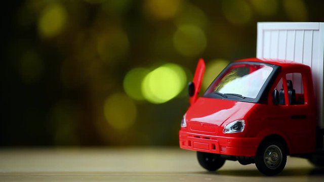 toy car wooden table gold bokeh hd footage 