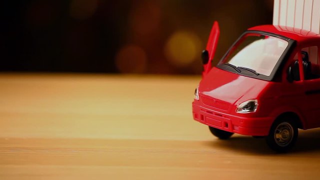 toy car wooden table gold bokeh hd footage 