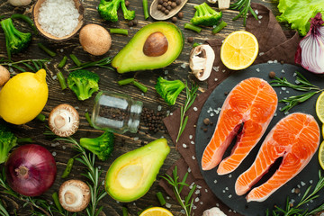Fresh pieces of steak salmon, trout, salmon, pink salmon. With ingredients. Healthy and clean food. Diet and veganism, background for design, market, products, restaurant and home cooking, recipes